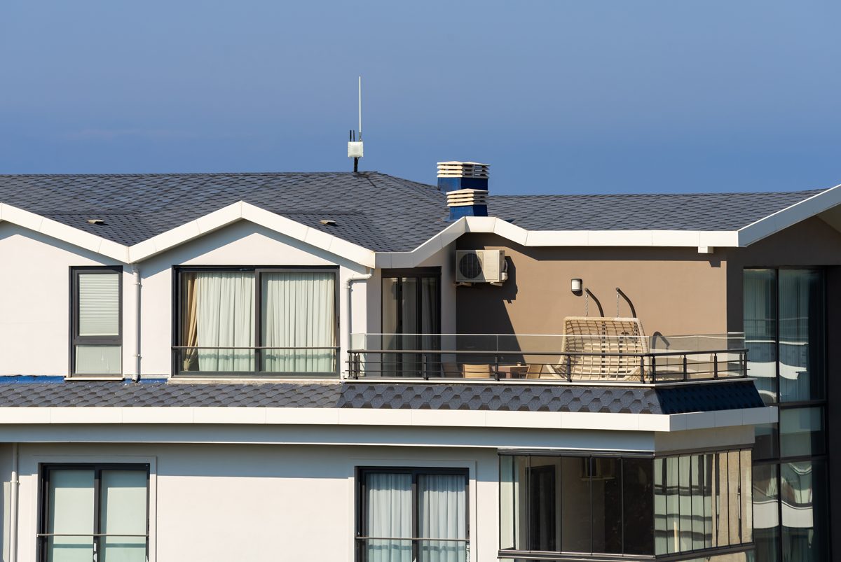 CellGate OmniPoint Gateway mounted at an apartment complex, wirelessly linking gates and amenities across the property