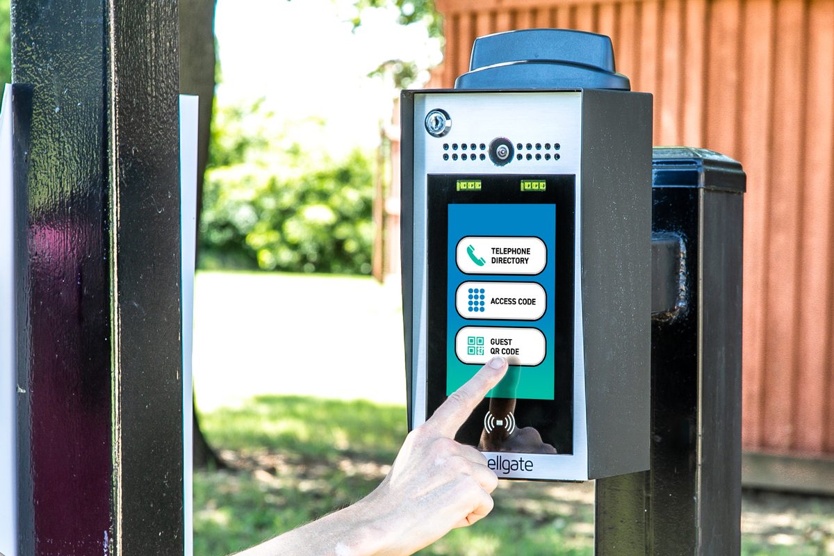 Visitor touching the Guest QR Code option on a CellGate Watchman W480 touchscreen entry unit