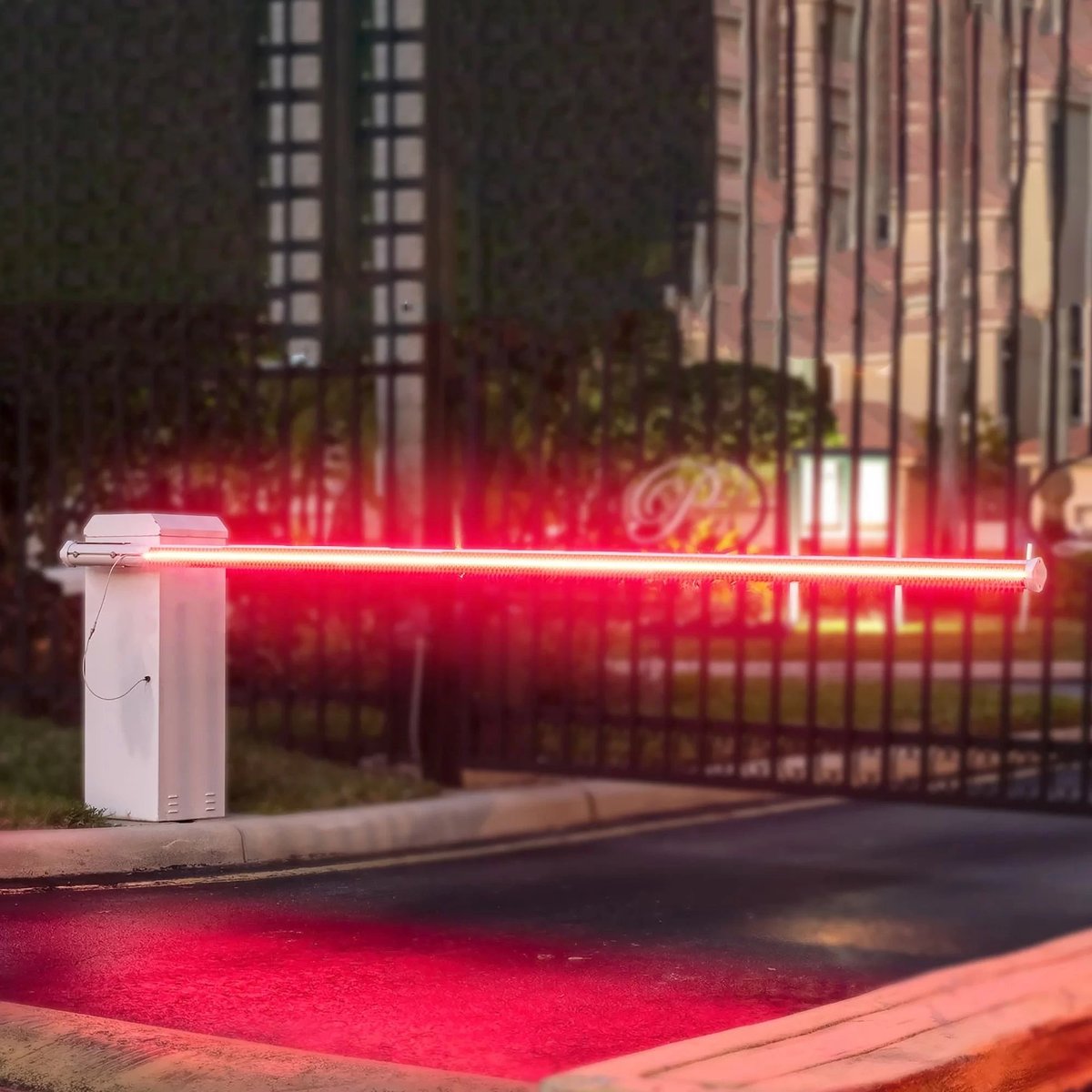 LiftMaster barrier arm lit up at night