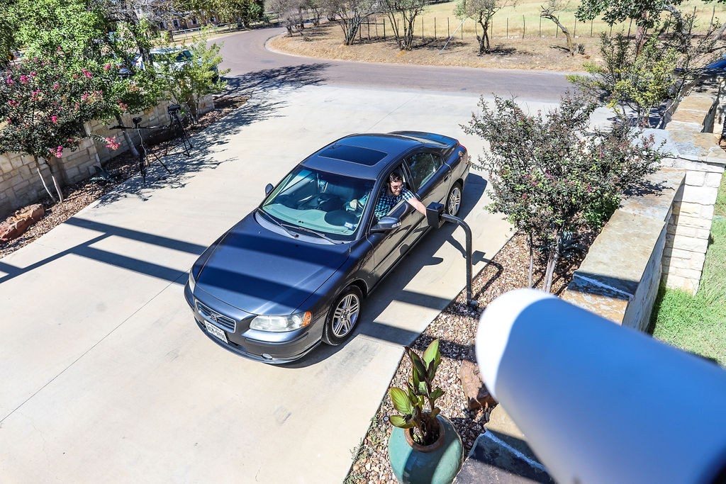 Vehicle arriving at a secured gated entrance